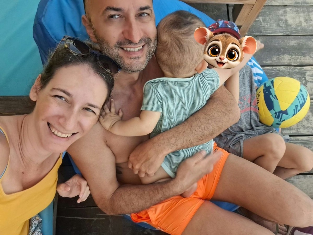 The Kotsev family: mum, dad and their two children (the baby seen from behind, the older child’s face covered by Shturko)